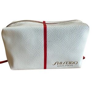 Shiseido Textured White Pouch with Bold Red Accent